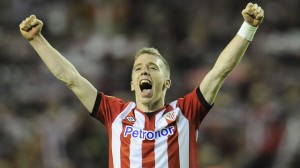 Athletic Bilbao forward Iker Muniain has insisted that he is happy at the club amid speculation linking the 19-year-old with a move to Bayern Munich.