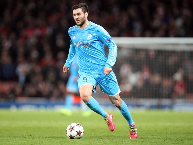 The agent of Olympique de Marseille striker Andre-Pierre Gignac, Christopher Hutteau, has suggested the player would fit in at Arsenal or Liverpool.